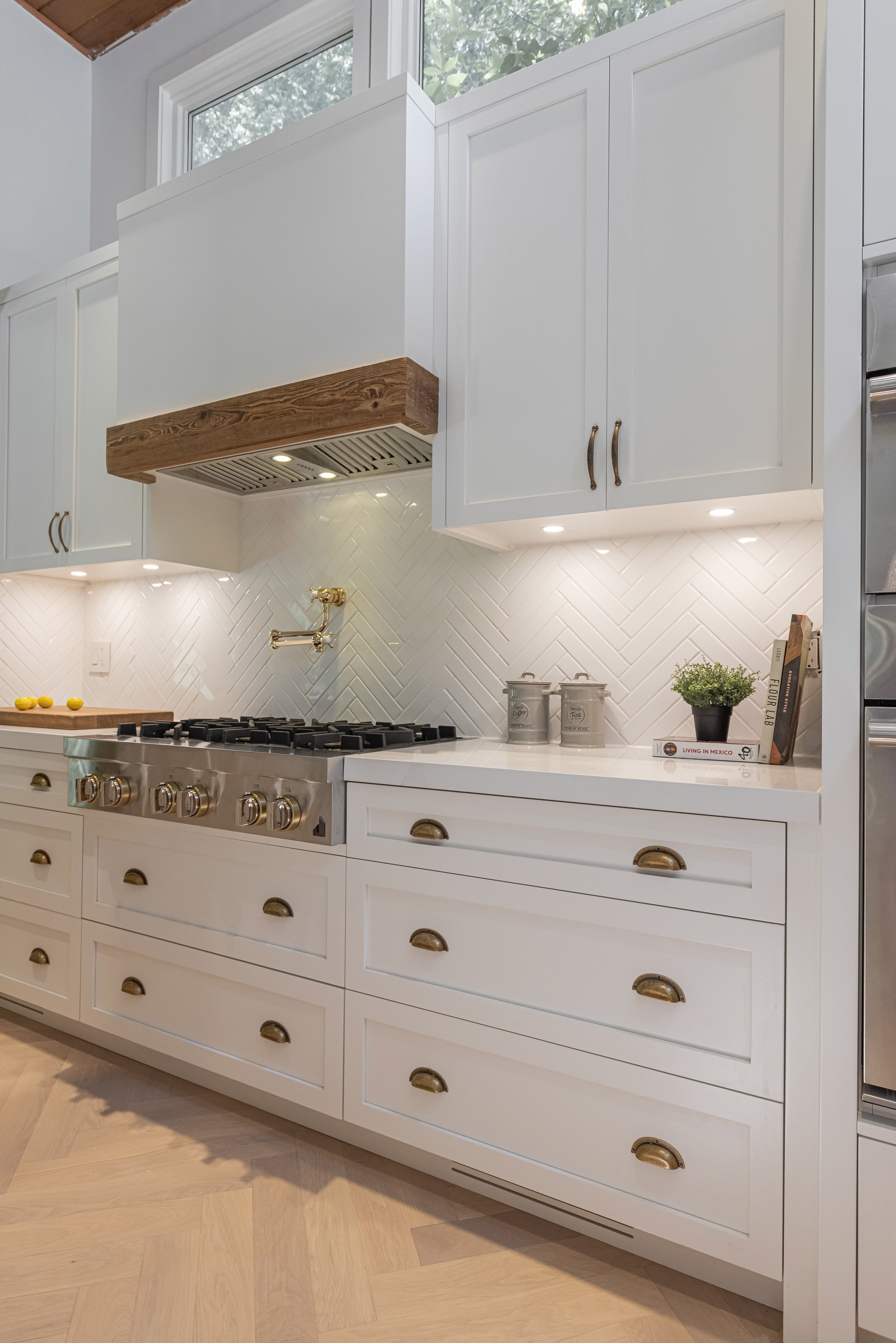 Custom shaker cabinetry and countertop detail by Metrico